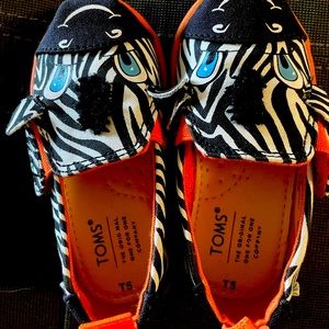 Toms tiny zebra slip on shoes